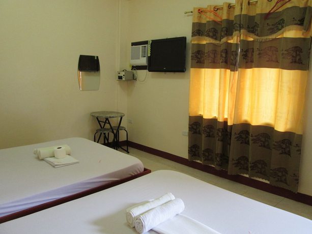Imagen de la habitación del Hotel La Bella Casa De Boracay. Foto 9