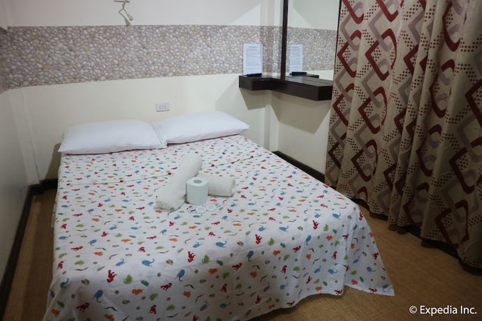 Imagen de la habitación del Hotel La Bella Casa De Boracay. Foto 10