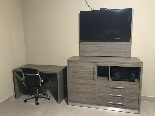 Imagen de la habitación del Hotel La Bella Inn. Foto 19