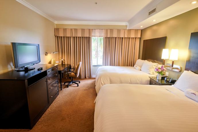 Imagen de la habitación del Hotel La Bellasera And Suites. Foto 5