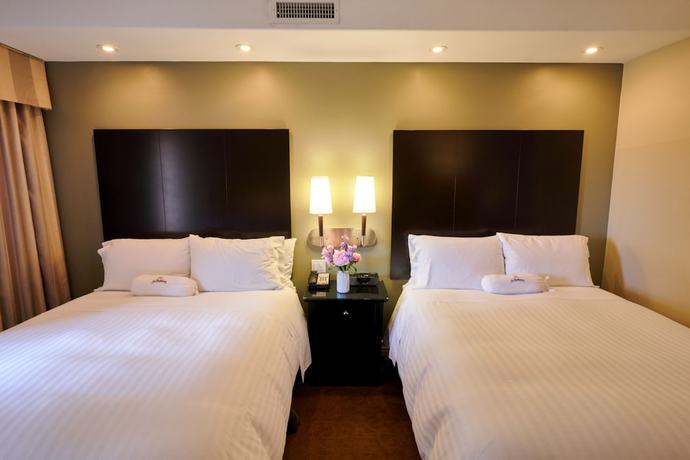 Imagen de la habitación del Hotel La Bellasera And Suites. Foto 7