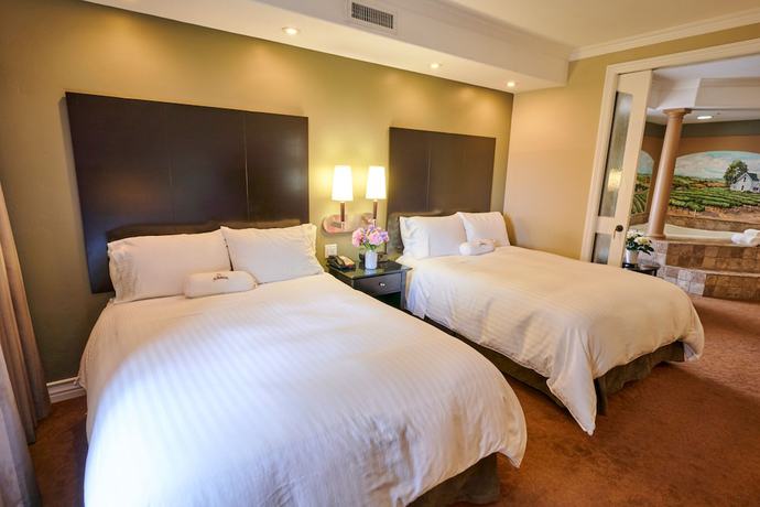 Imagen de la habitación del Hotel La Bellasera And Suites. Foto 11