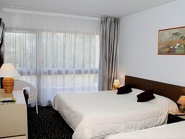 Imagen de la habitación del Hotel La Belle Poule. Foto 12