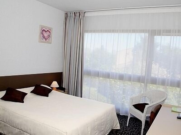 Imagen de la habitación del Hotel La Belle Poule. Foto 14