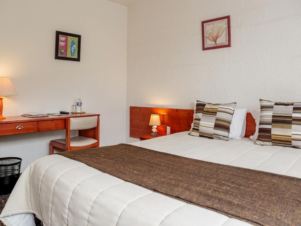 Imagen de la habitación del Hotel La Belle Poule. Foto 16