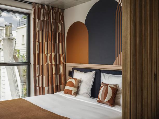 Imagen de la habitación del Hotel La Belle Ville. Foto 6