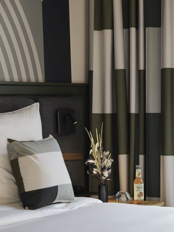 Imagen de la habitación del Hotel La Belle Ville. Foto 13