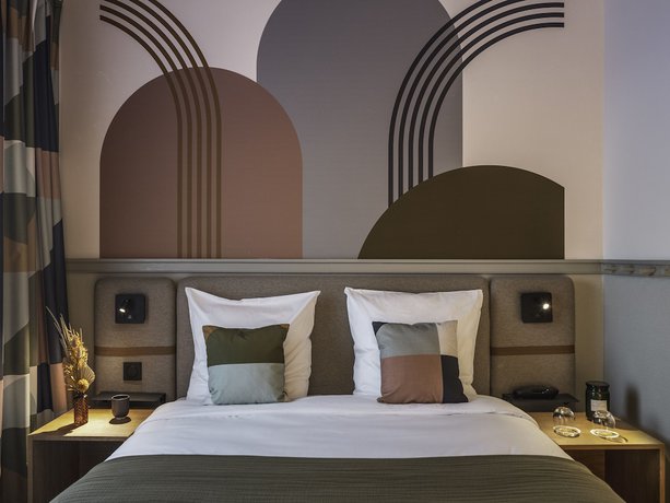 Imagen de la habitación del Hotel La Belle Ville. Foto 16