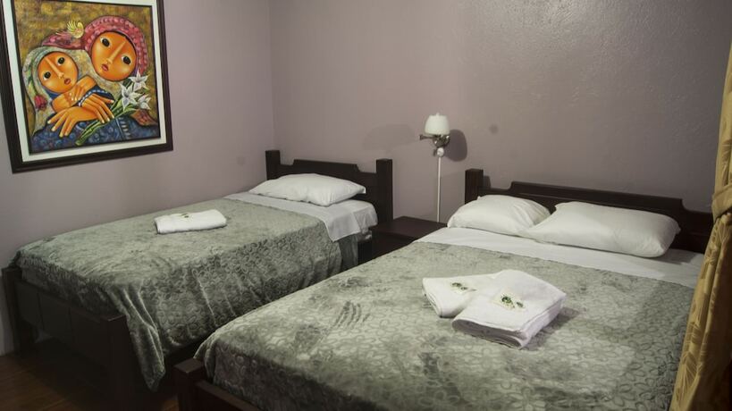 Imagen de la habitación del Hotel La Belle Vue Lodge. Foto 15