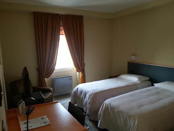 Imagen de la habitación del Hotel La Bettola. Foto 15
