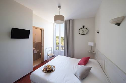 Imagen de la habitación del Hotel La Bienvenue. Foto 9
