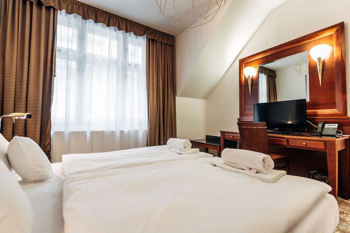 Imagen de la habitación del Hotel La Bohemia. Foto 8