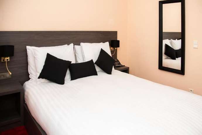 Imagen de la habitación del Hotel La Bourse. Foto 6