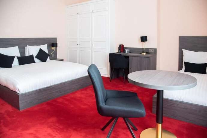 Imagen de la habitación del Hotel La Bourse. Foto 7