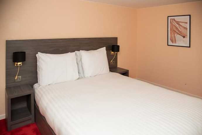 Imagen de la habitación del Hotel La Bourse. Foto 10