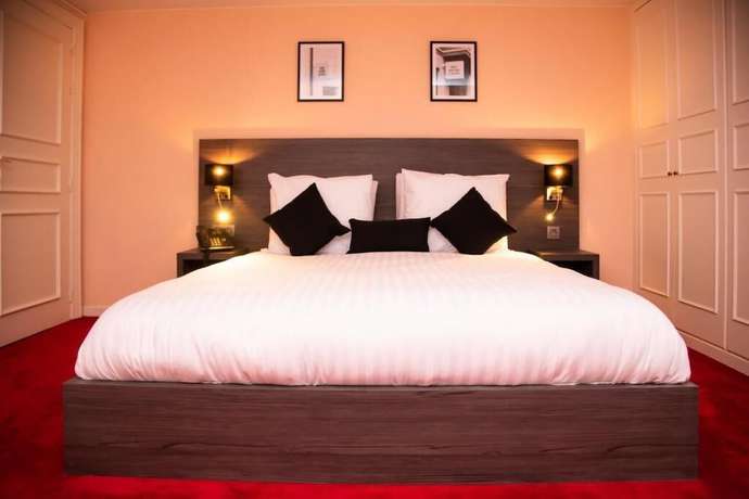 Imagen de la habitación del Hotel La Bourse. Foto 11