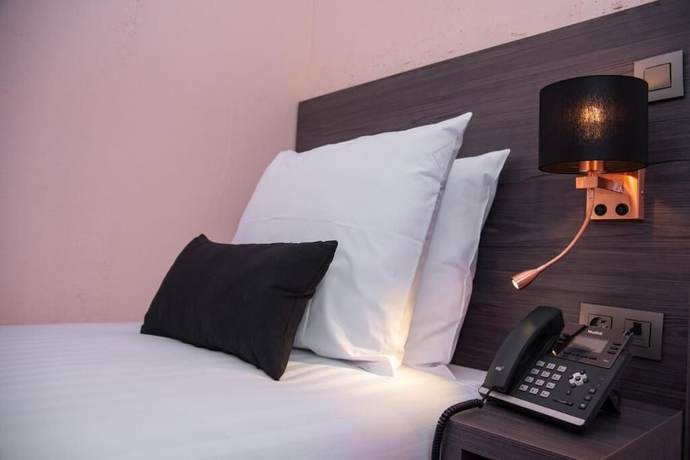 Imagen de la habitación del Hotel La Bourse. Foto 14