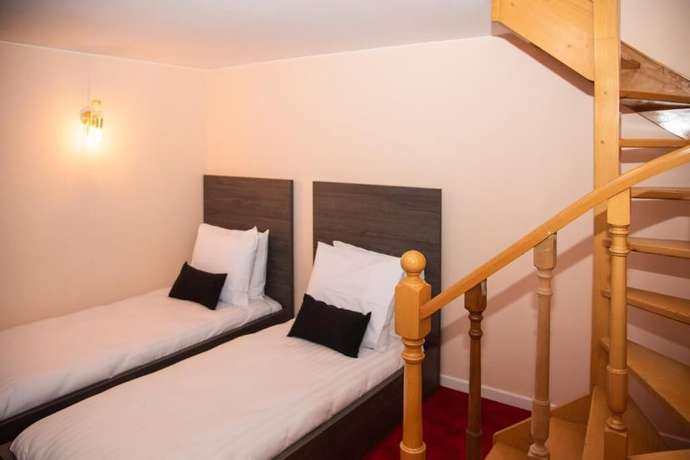 Imagen de la habitación del Hotel La Bourse. Foto 15