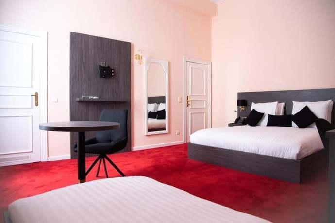 Imagen de la habitación del Hotel La Bourse. Foto 16
