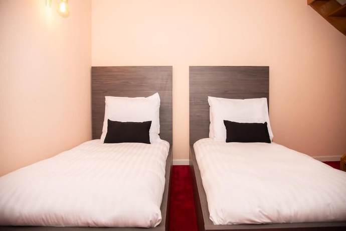 Imagen de la habitación del Hotel La Bourse. Foto 17