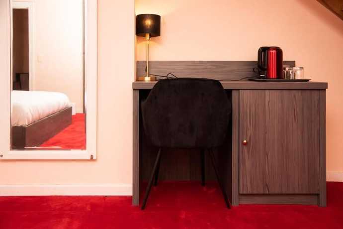 Imagen de la habitación del Hotel La Bourse. Foto 18