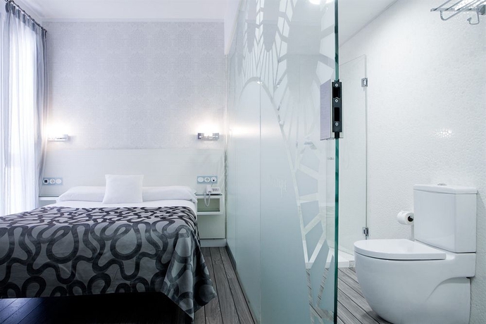 Imagen de la habitación del Hotel La Boutique Puerta Osario. Foto 7