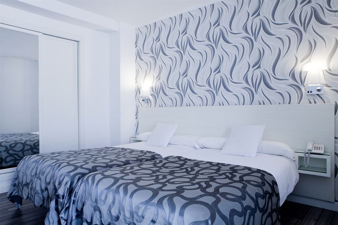 Imagen de la habitación del Hotel La Boutique Puerta Osario. Foto 9