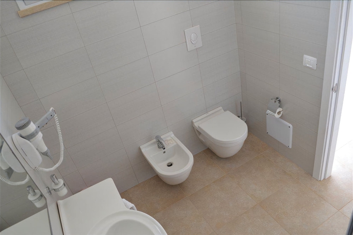 Imagen de la habitación del Hotel La Brunese. Foto 13