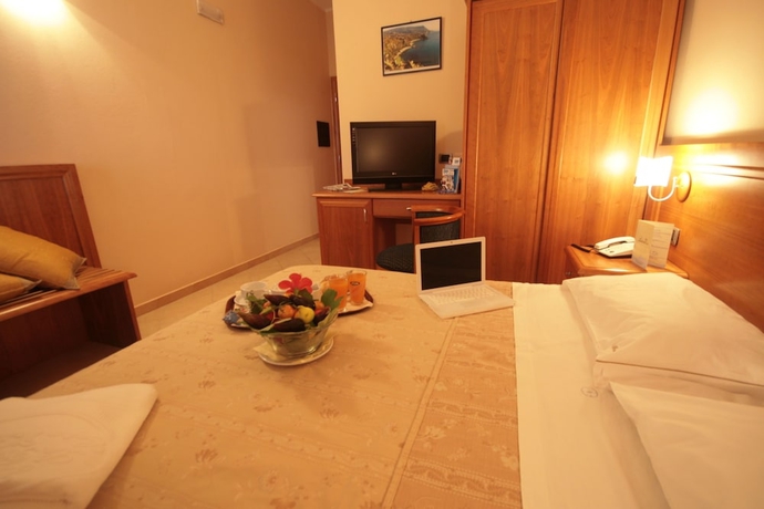 Imagen de la habitación del Hotel La Bussola Restaurant. Foto 10