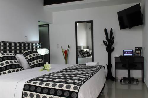 Imagen de la habitación del Hotel La Cabrera Boutique. Foto 1