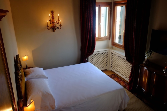 Imagen de la habitación del Hotel La Calcina. Foto 9