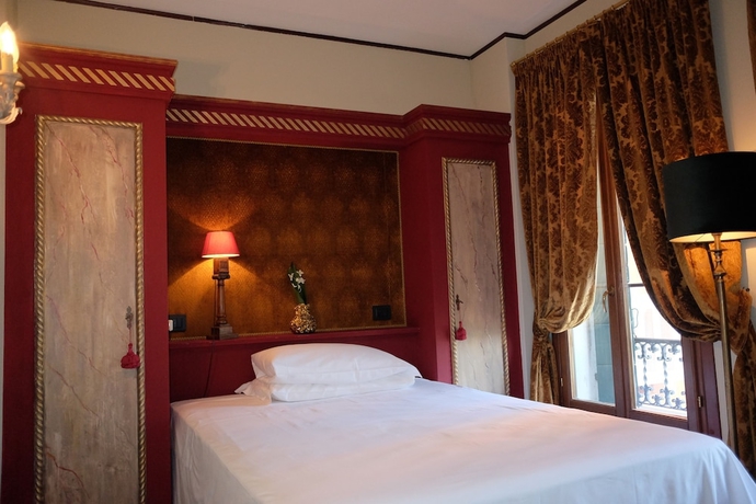 Imagen de la habitación del Hotel La Calcina. Foto 10