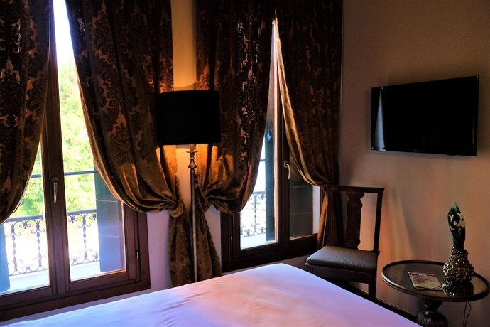 Imagen de la habitación del Hotel La Calcina. Foto 11