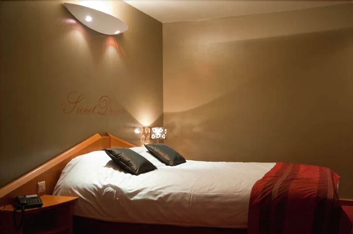 Imagen de la habitación del Hotel La Calèche. Foto 10