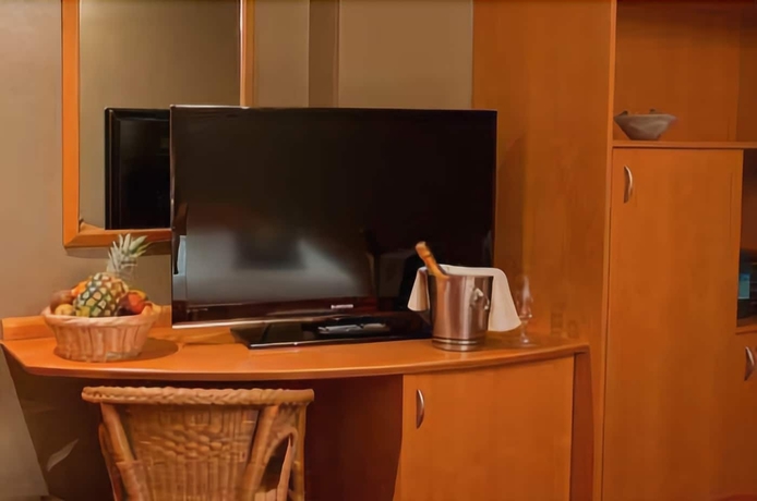 Imagen de la habitación del Hotel La Calèche. Foto 11