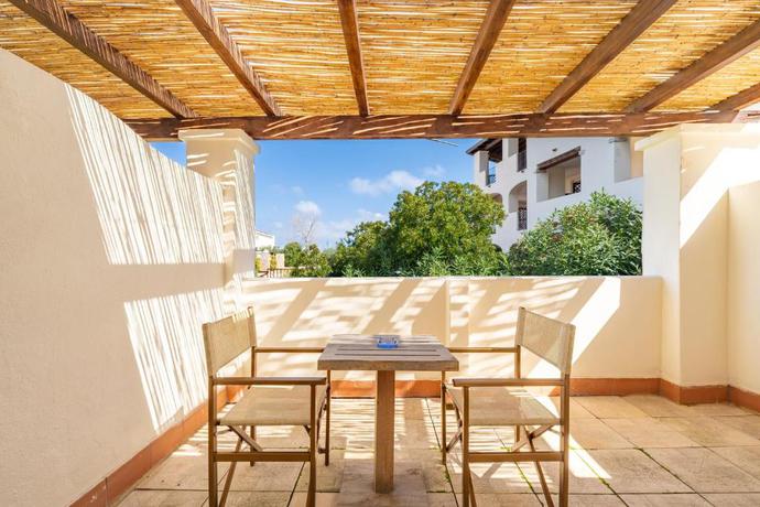Imagen de la habitación del Hotel La Caletta Village. Foto 4