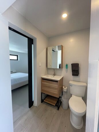 Imagen de la habitación del Hotel La Calma Poshtel. Foto 11