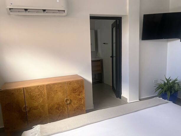 Imagen de la habitación del Hotel La Calma Poshtel. Foto 12