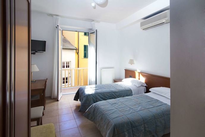Imagen de la habitación del Hotel La Camogliese. Foto 8