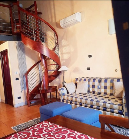 Imagen de la habitación del Hotel La Cantina Residence. Foto 4