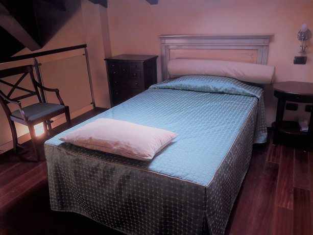 Imagen de la habitación del Hotel La Cantina Residence. Foto 5