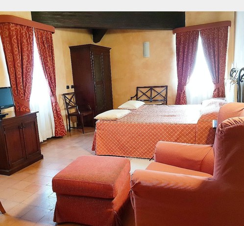 Imagen de la habitación del Hotel La Cantina Residence. Foto 8