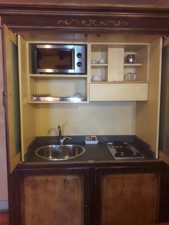 Imagen de la habitación del Hotel La Cantina Residence. Foto 14