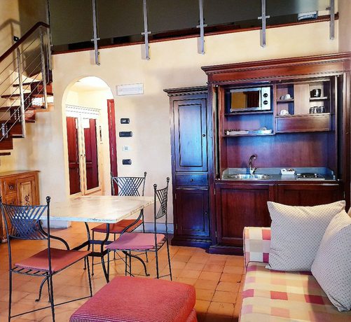 Imagen de la habitación del Hotel La Cantina Residence. Foto 15