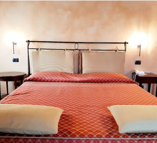 Imagen de la habitación del Hotel La Cantina Residence. Foto 16