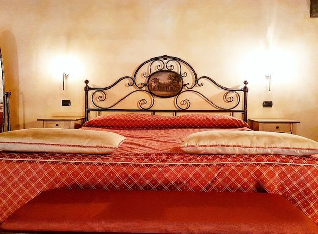 Imagen de la habitación del Hotel La Cantina Residence. Foto 18