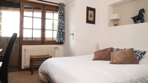 Imagen de la habitación del Hotel La Capitelle. Foto 7