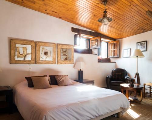 Imagen de la habitación del Hotel La Capitelle. Foto 12