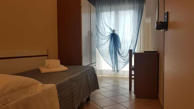 Imagen de la habitación del Hotel La Cappuccina. Foto 16