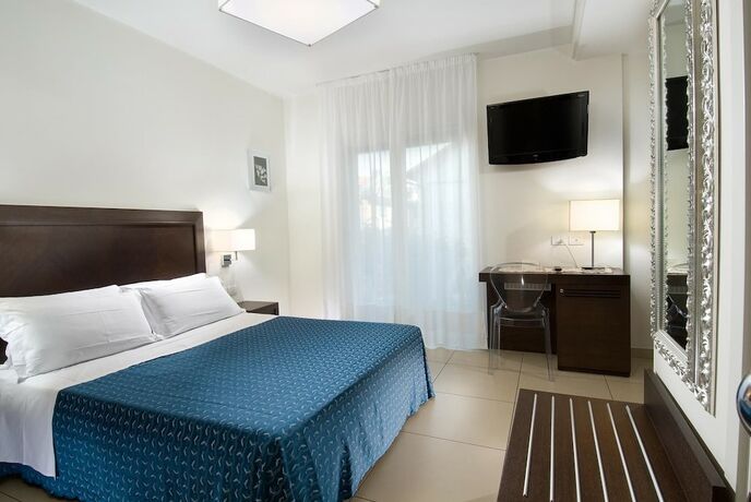 Imagen de la habitación del Hotel La Cappuccina. Foto 17